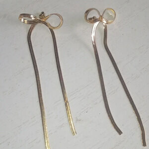 Gold tone bow dangle‎ earrings